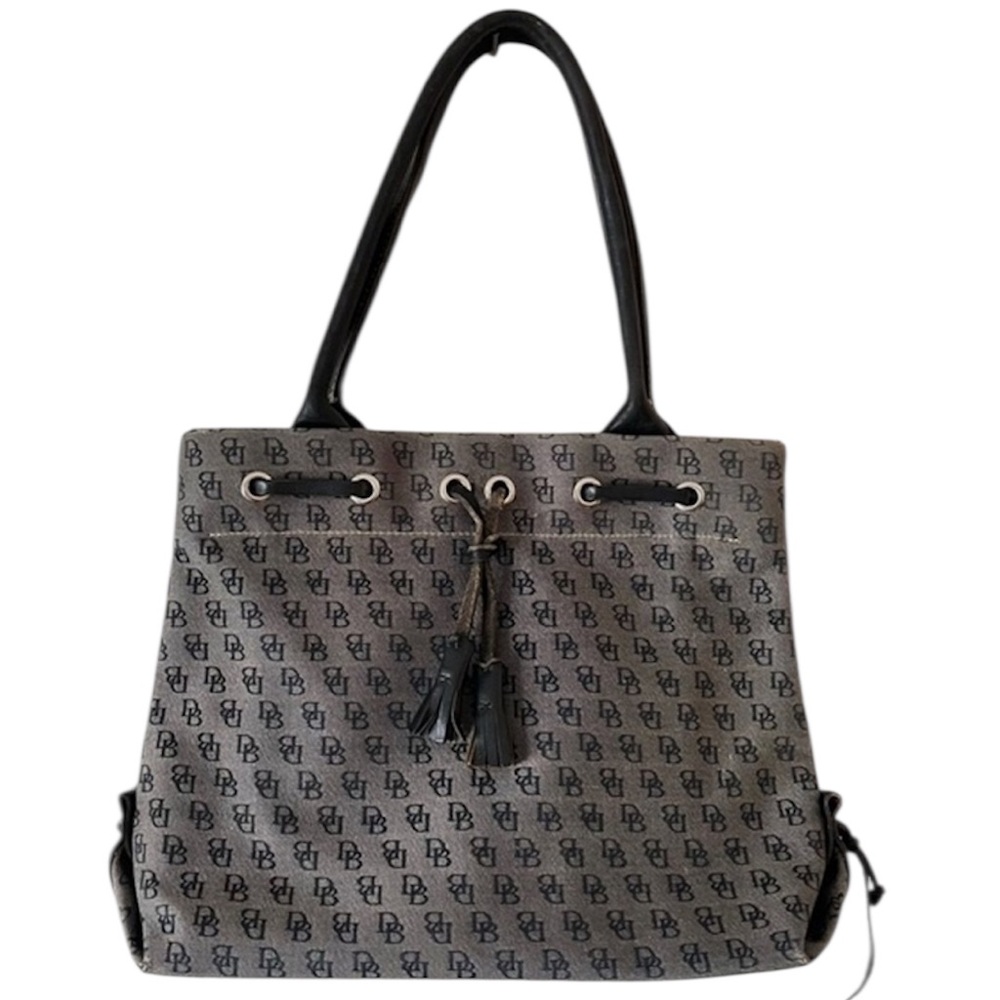 Dooney & Bourke Black & gray monogram Tote w/ silver hardware. Tassel detailing